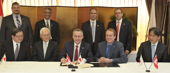 Minister Fast signs space collaboration memorandun with Japan.