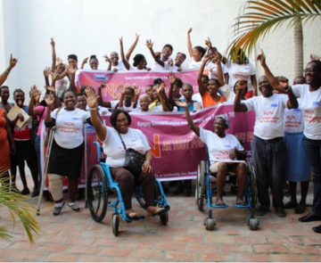 A group of people with disabilities waiving