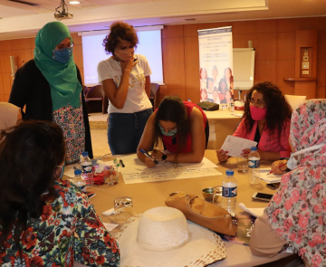 Tunisian women working in a group
